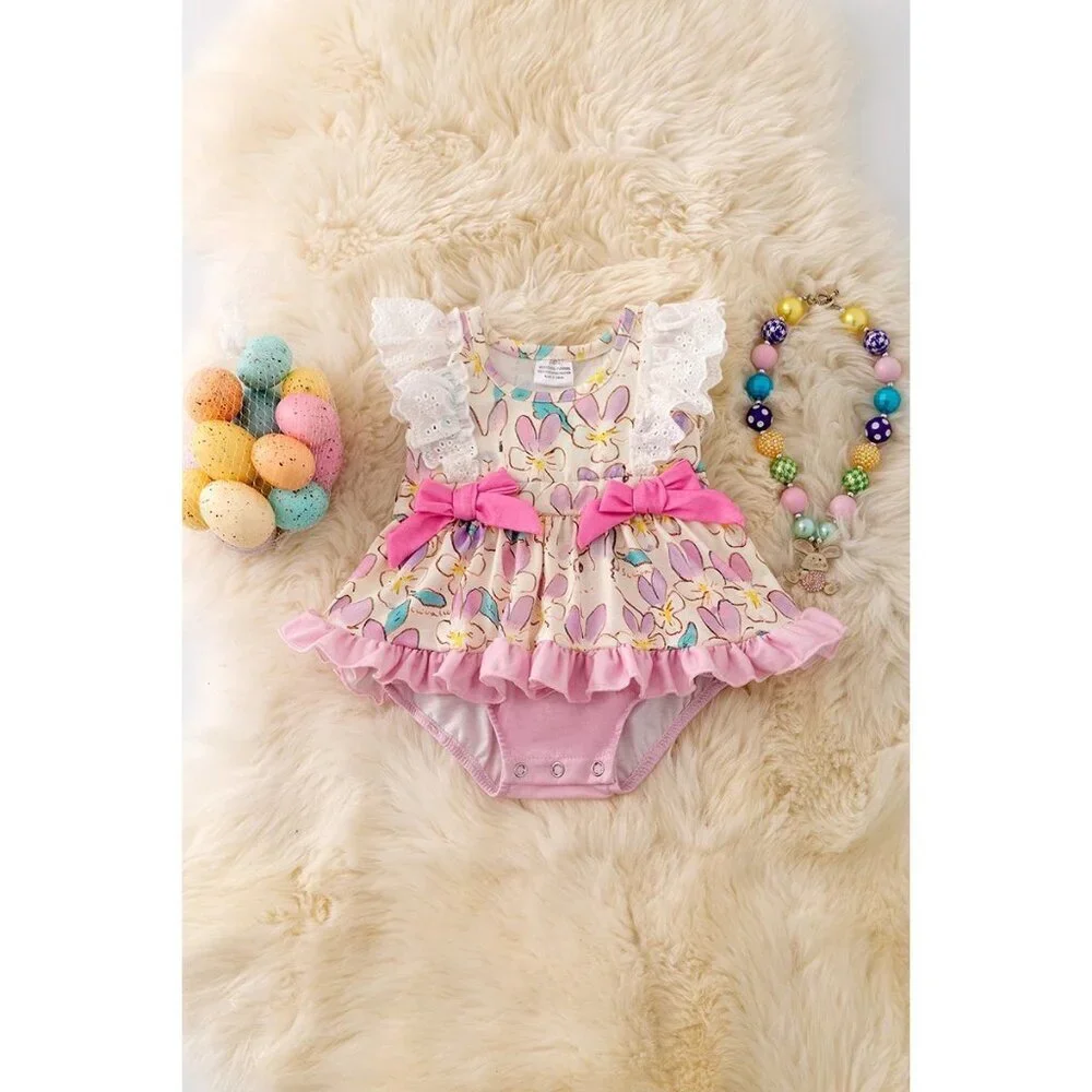 Lilac, blue & fuchsia twirl onesie with side bows. RPG50210 SOL